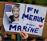 Macron, Le Pen Exchange May Day Blows Across Paris